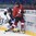 POPRAD, SLOVAKIA - APRIL 15: Finland's Aleksi Anttalainen #4 checks Switzerland's Nicolas Muller #9 during preliminary round action at the 2017 IIHF Ice Hockey U18 World Championship. (Photo by Andrea Cardin/HHOF-IIHF Images)